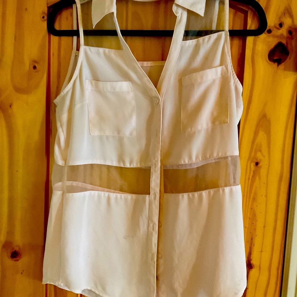 Woman’s blouse with sheer cut outs